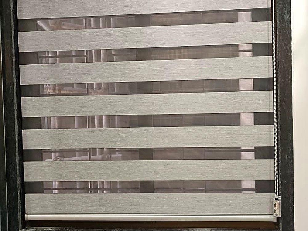 Zebra blinds fitted in a bedroom window in Vesu, Surat