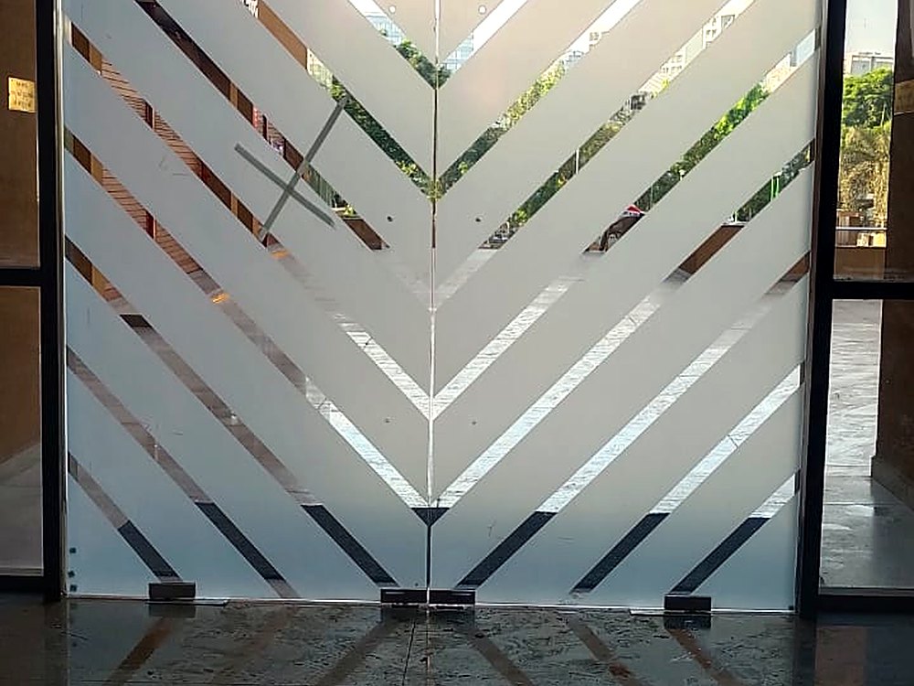 Sun control window film applied to a home window in Surat