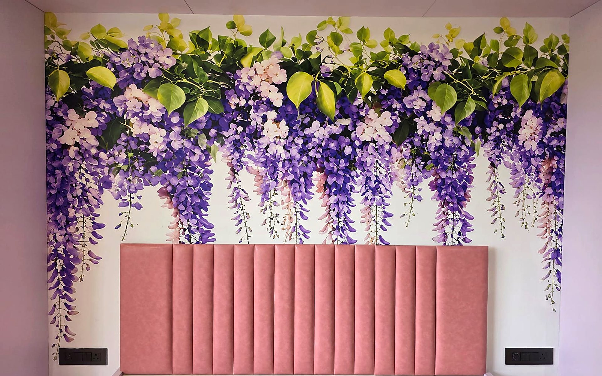 Customised tropical mural wallpaper installed in a bedroom in Surat